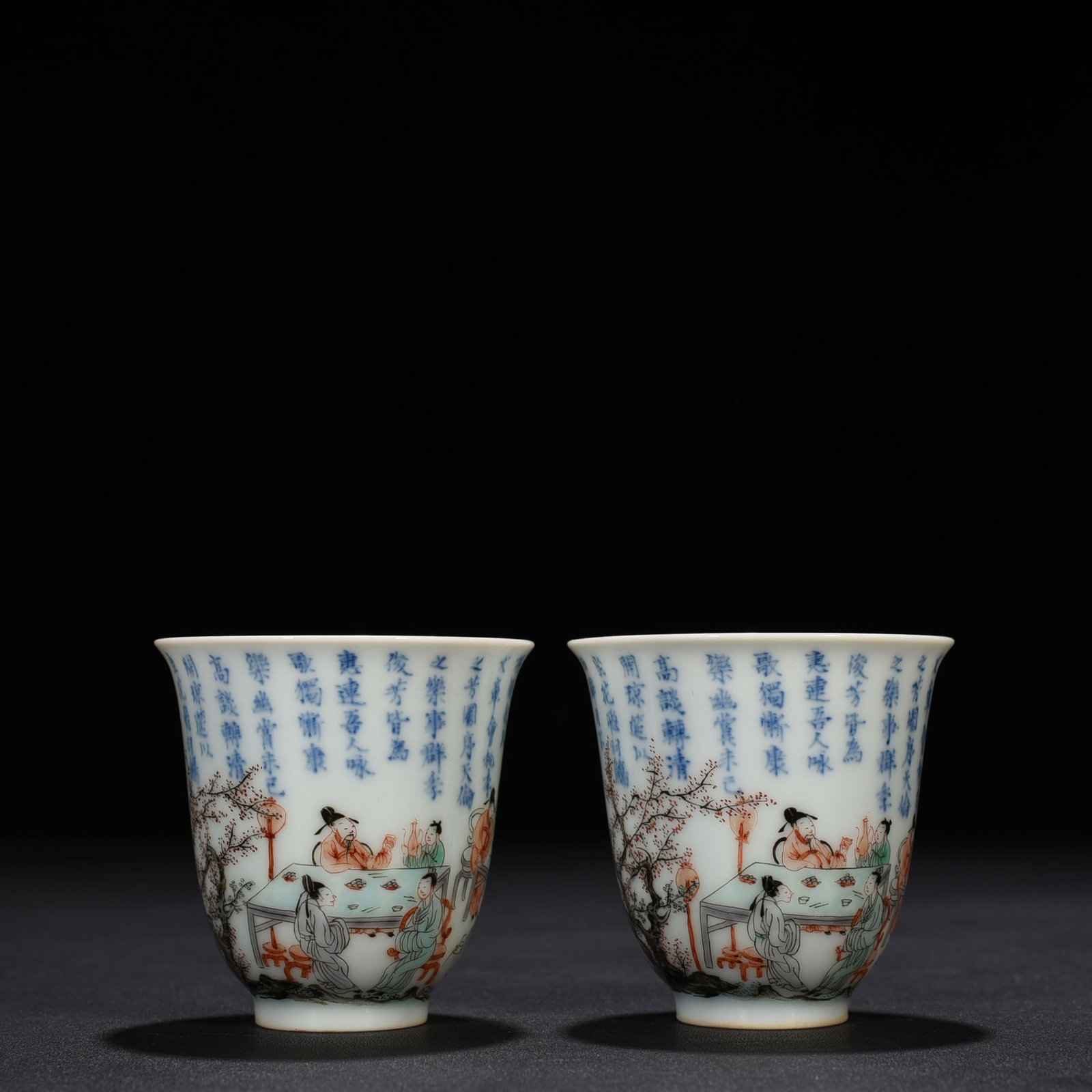 Qing Dynasty Kangxi blue and white colorful peach and plum garden poetry bell cup