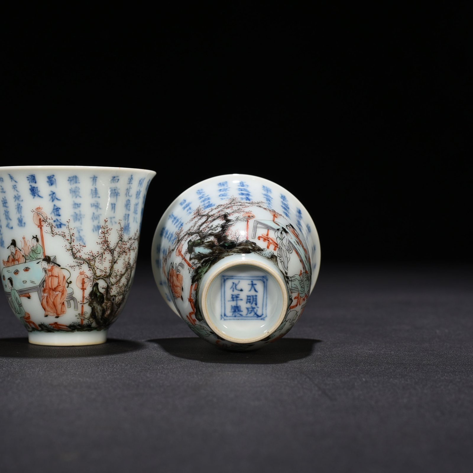 Qing Dynasty Kangxi blue and white colorful peach and plum garden poetry bell cup