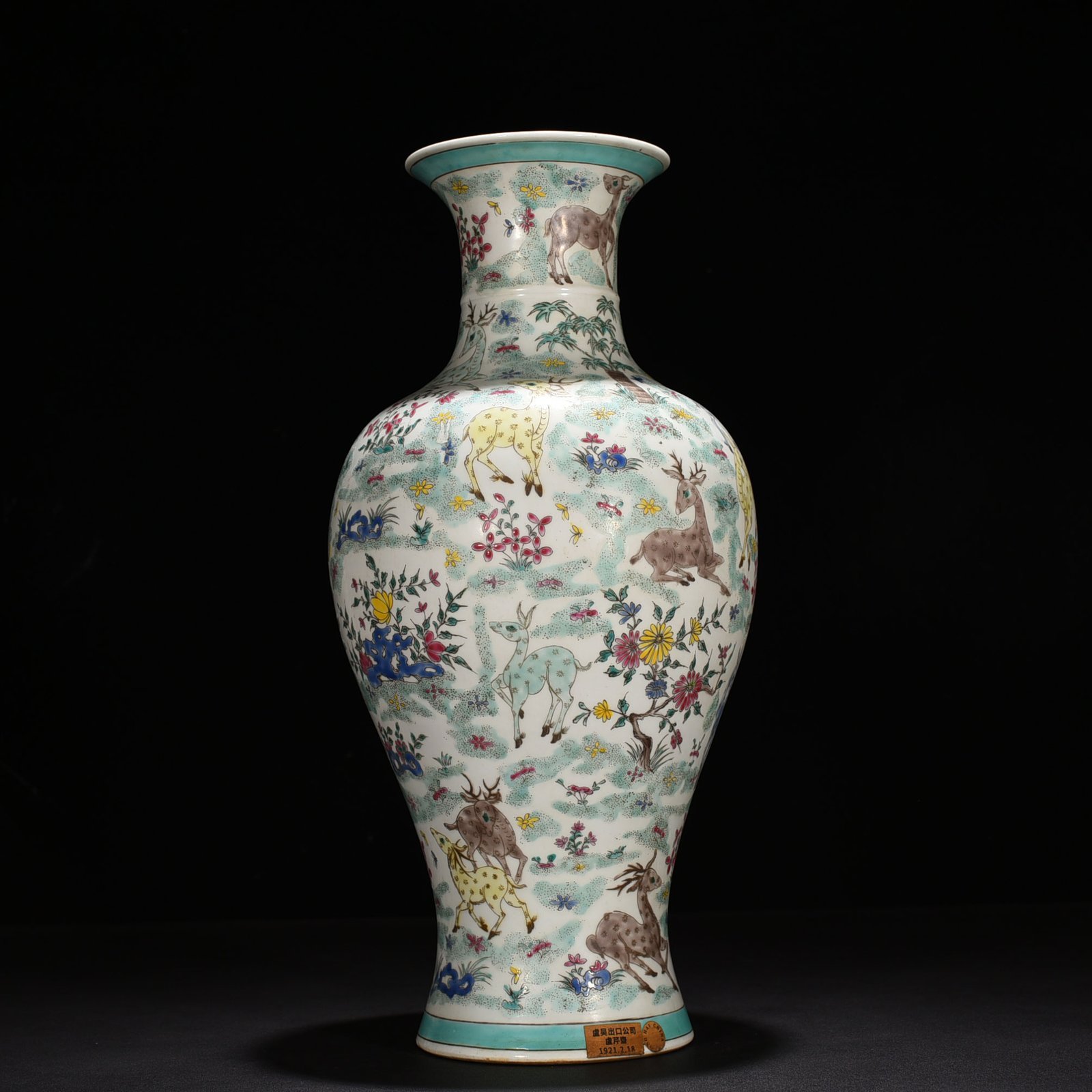 Qing Dynasty Kangxi pastel flower and deer vase