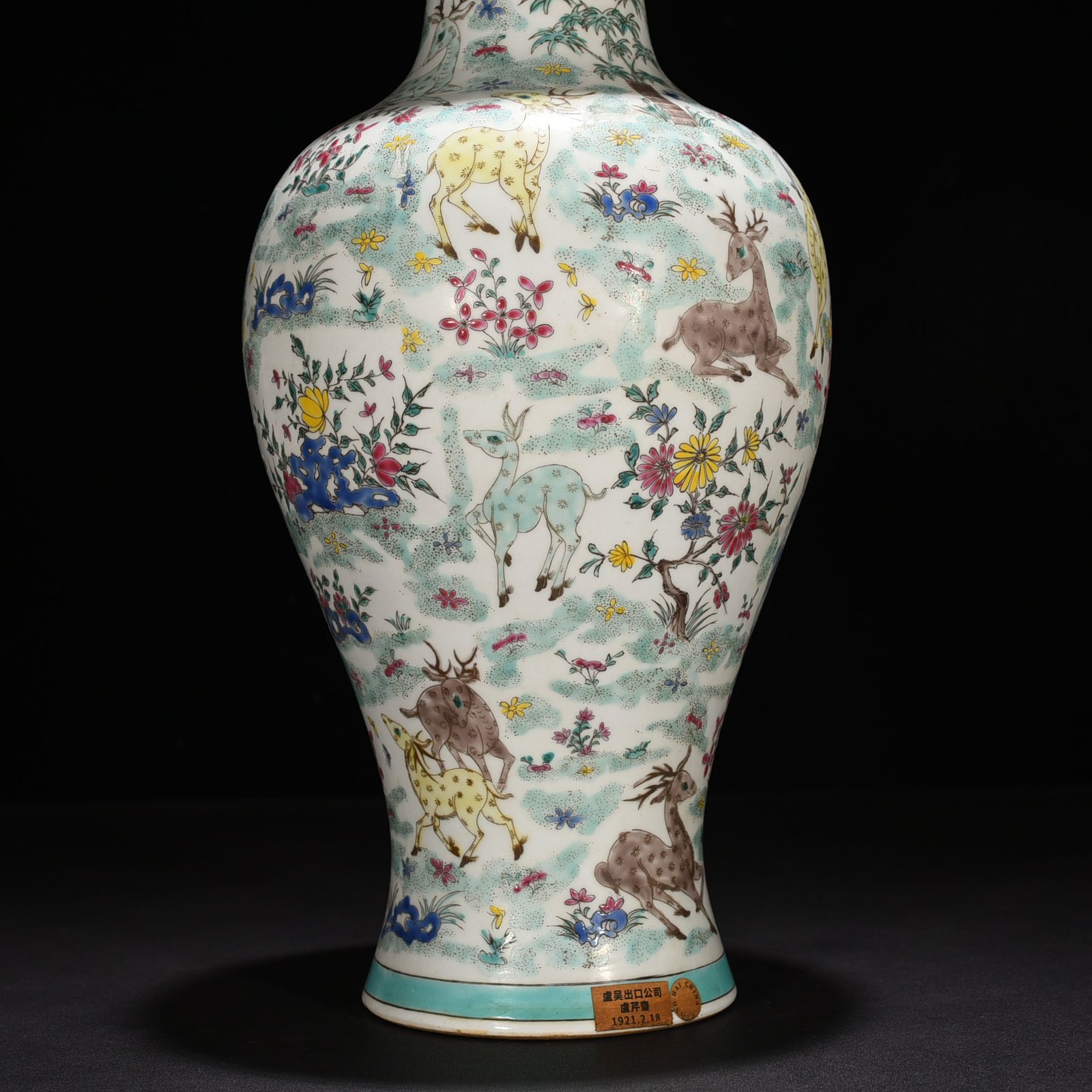 Qing Dynasty Kangxi pastel flower and deer vase
