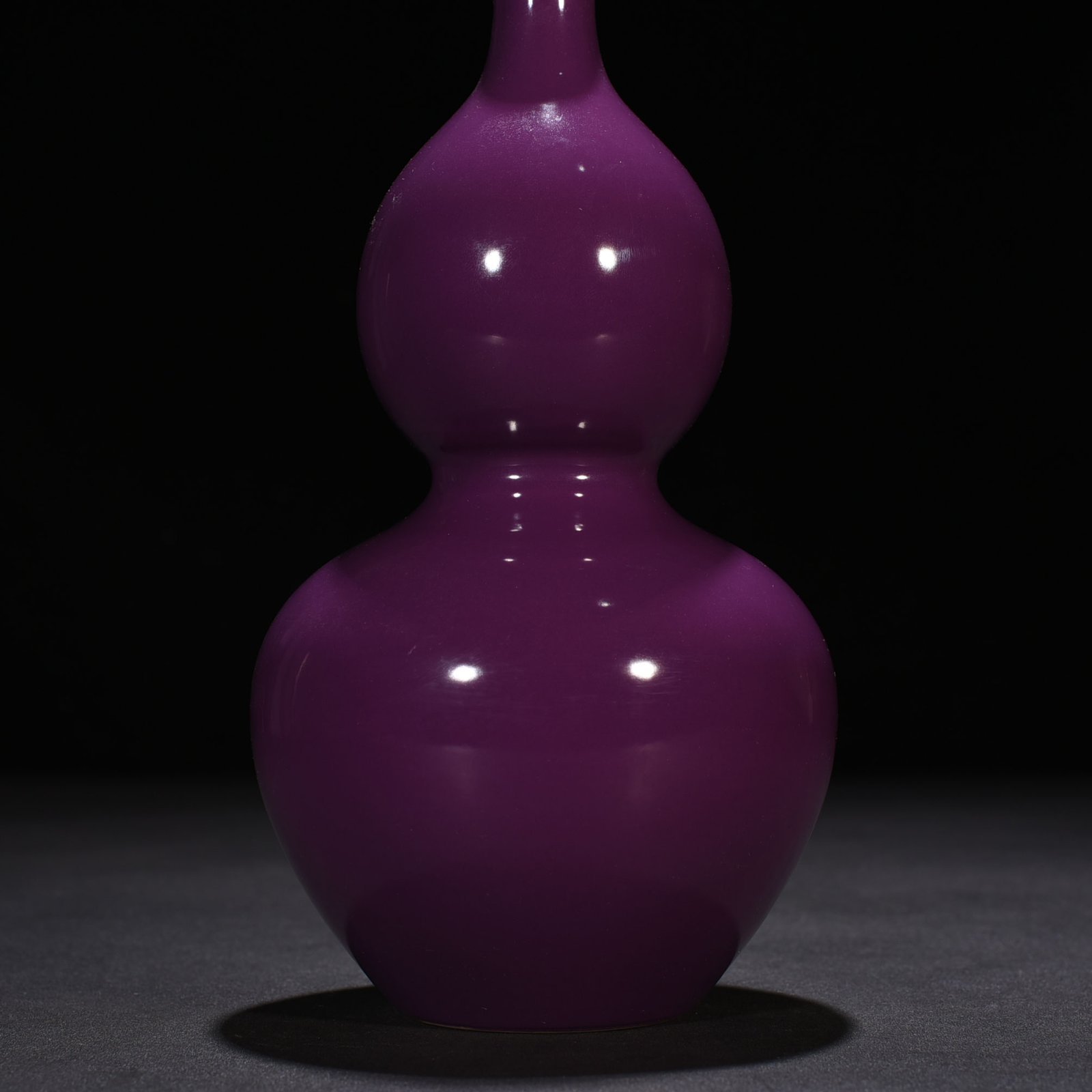 Qing Dynasty Kangxi eggplant skin purple glaze gourd bottle