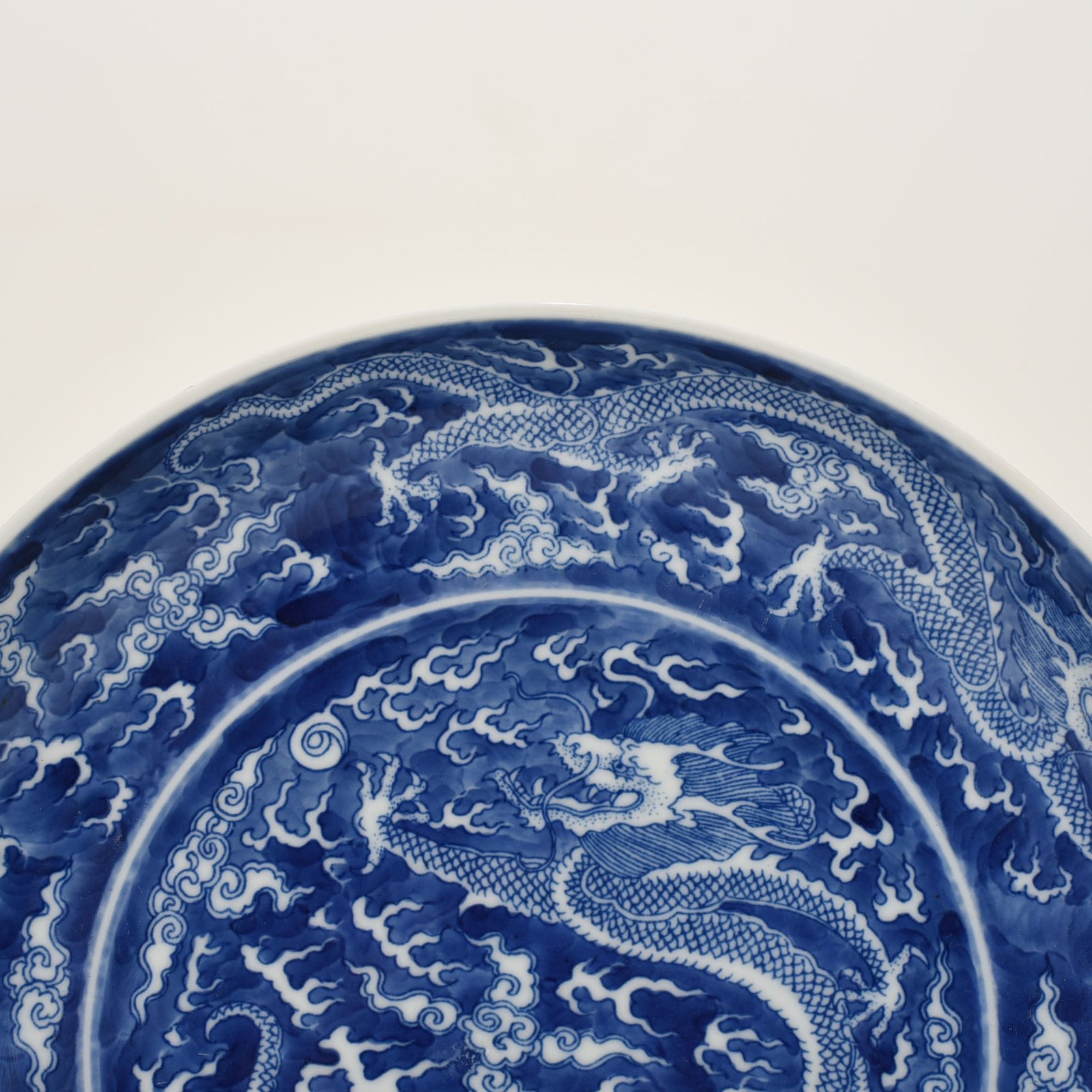 Qing Dynasty Kangxi blue and white dragon plate