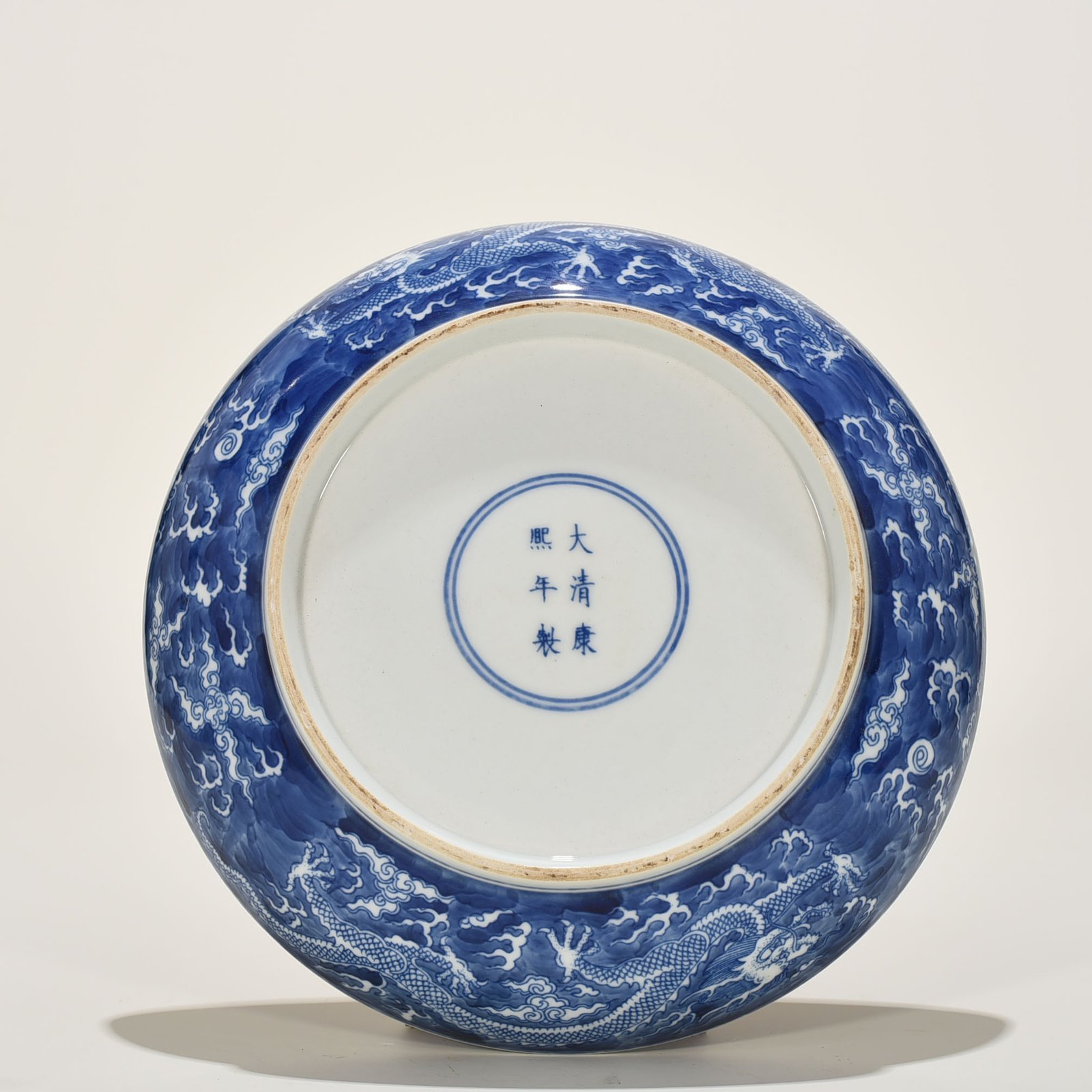 Qing Dynasty Kangxi blue and white dragon plate
