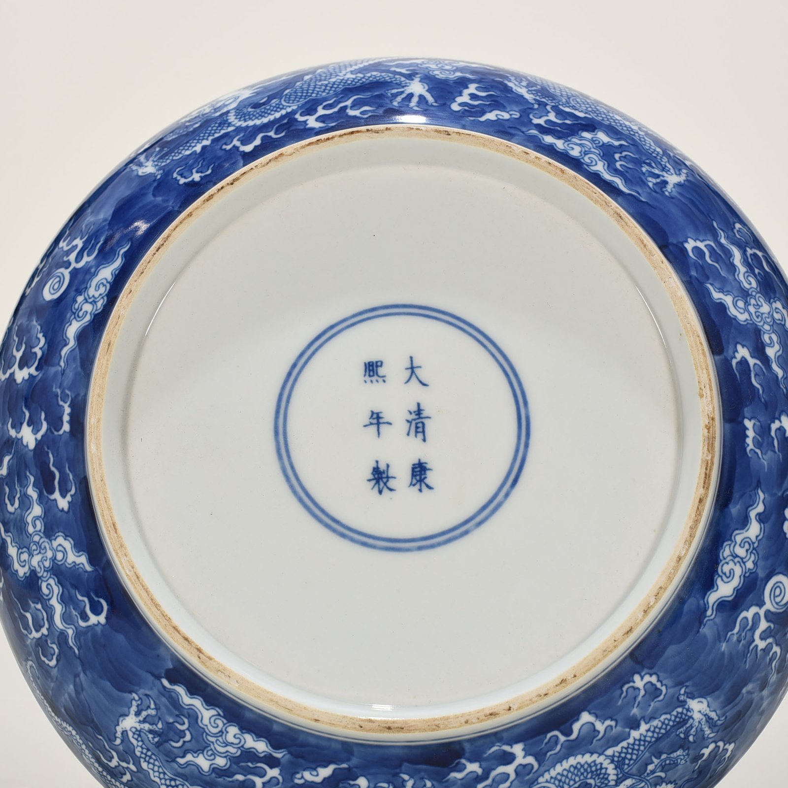 Qing Dynasty Kangxi blue and white dragon plate