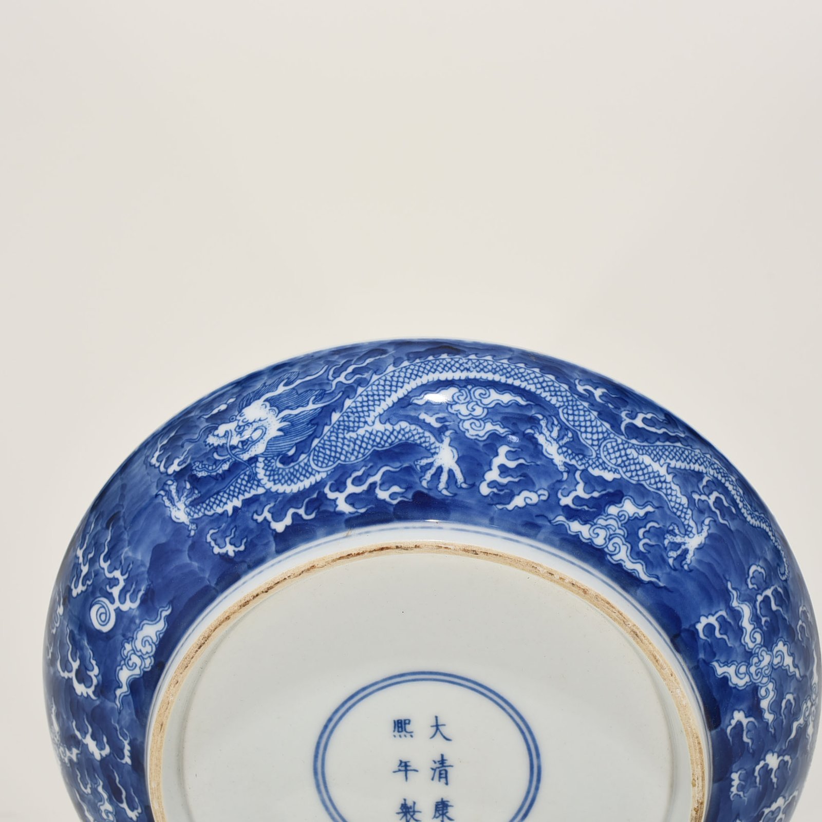 Qing Dynasty Kangxi blue and white dragon plate