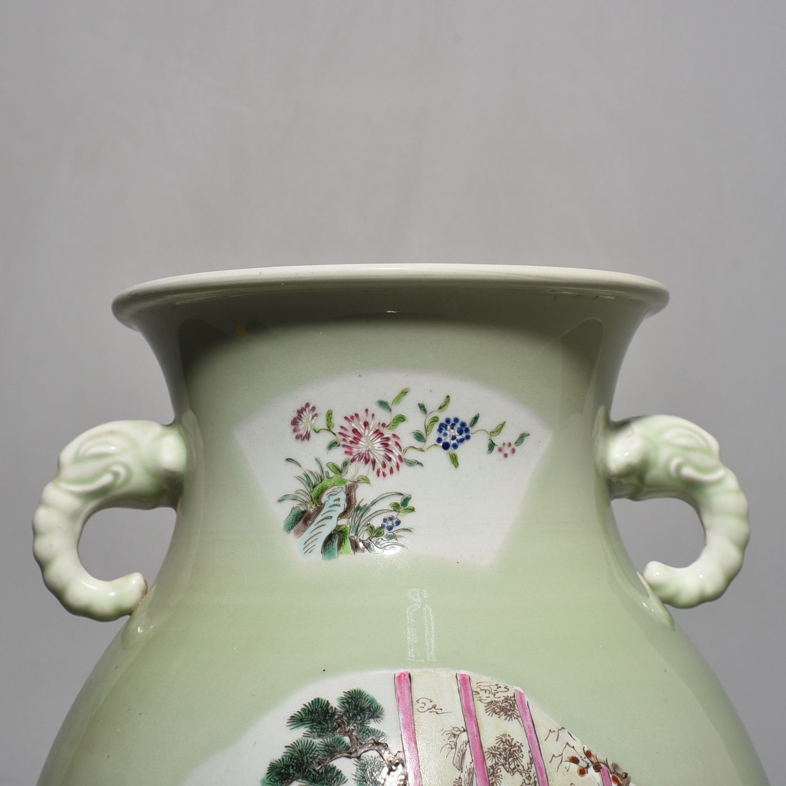 Qing Dynasty Kangxi bean green glaze pastel figure elephant ear statue