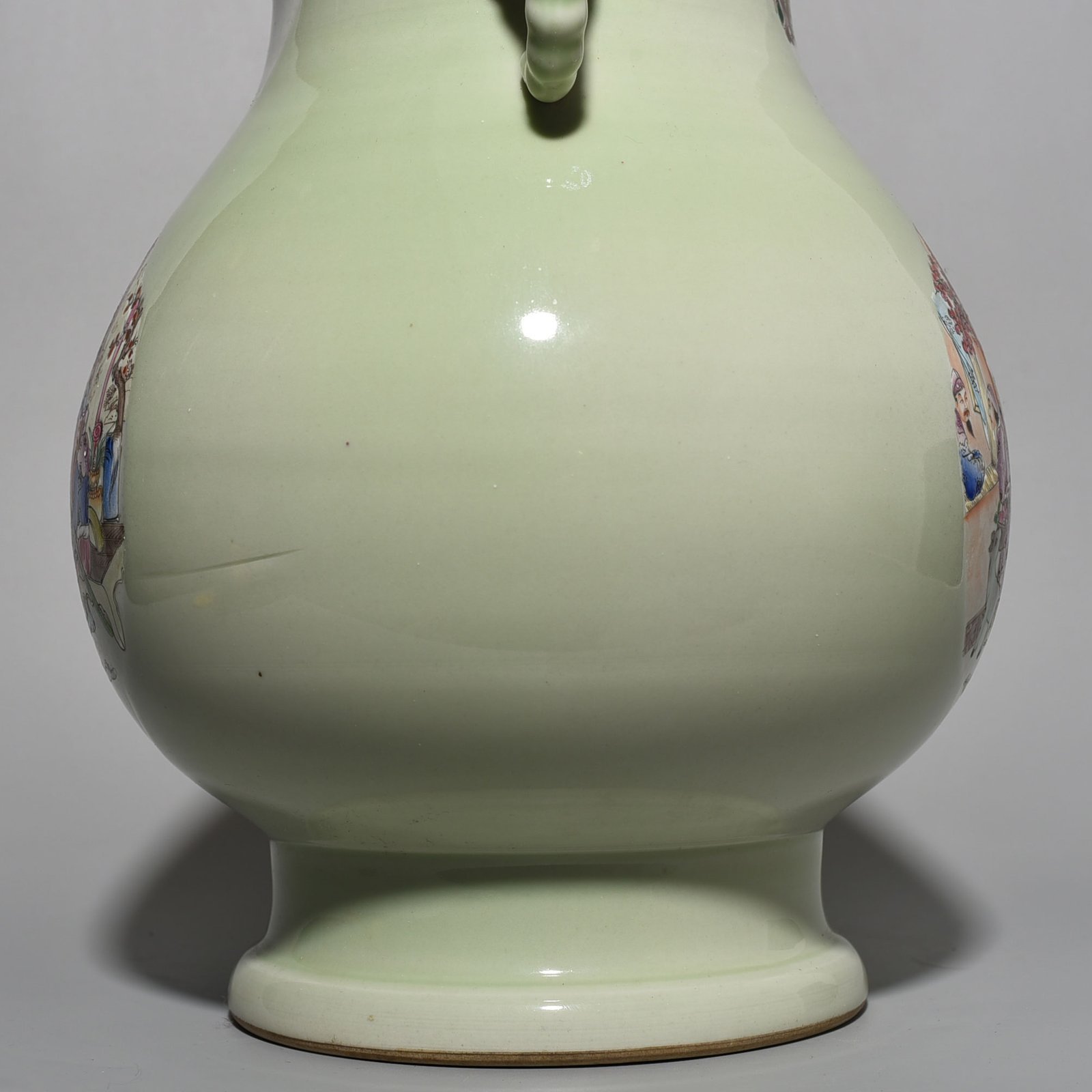 Qing Dynasty Kangxi bean green glaze pastel figure elephant ear statue