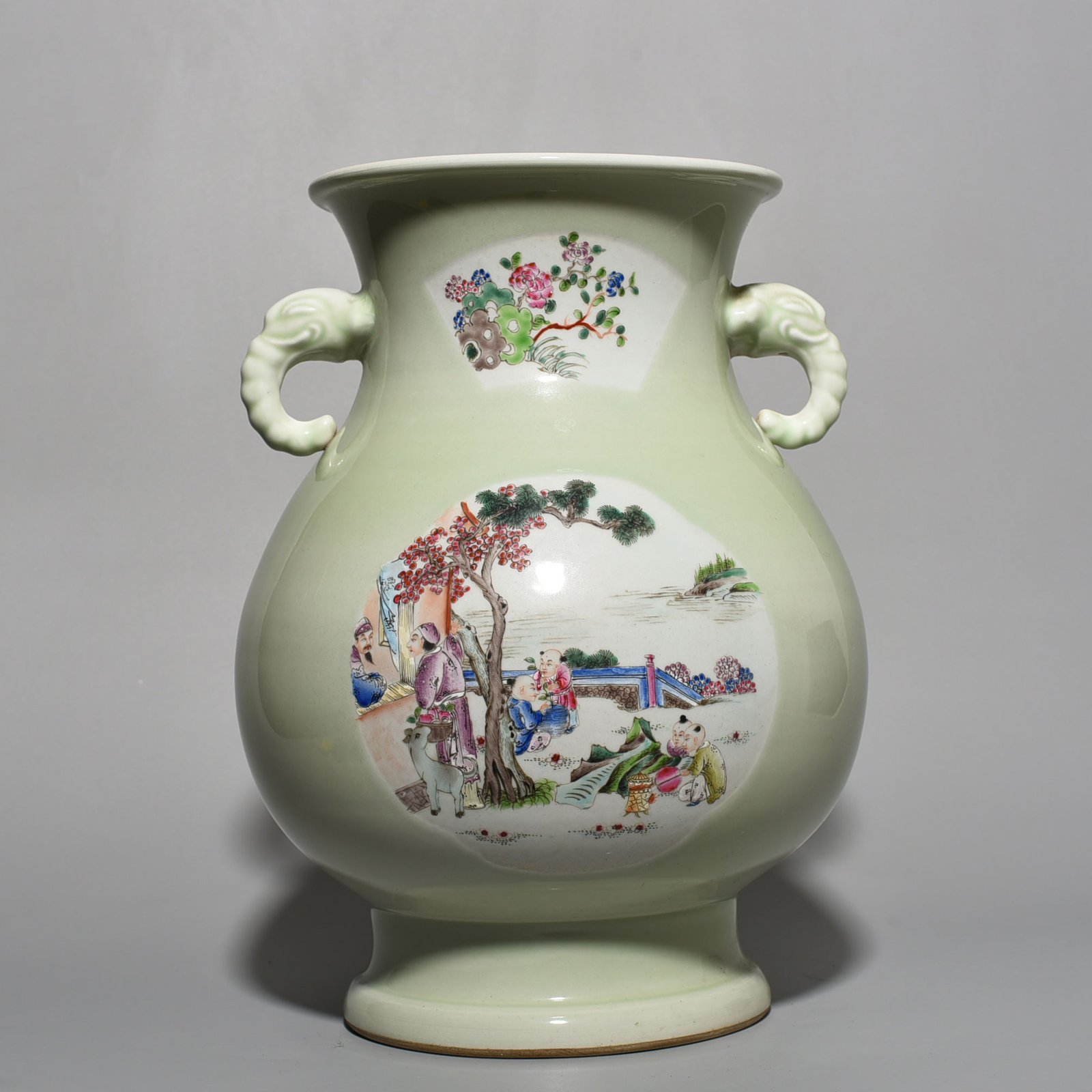 Qing Dynasty Kangxi bean green glaze pastel figure elephant ear statue