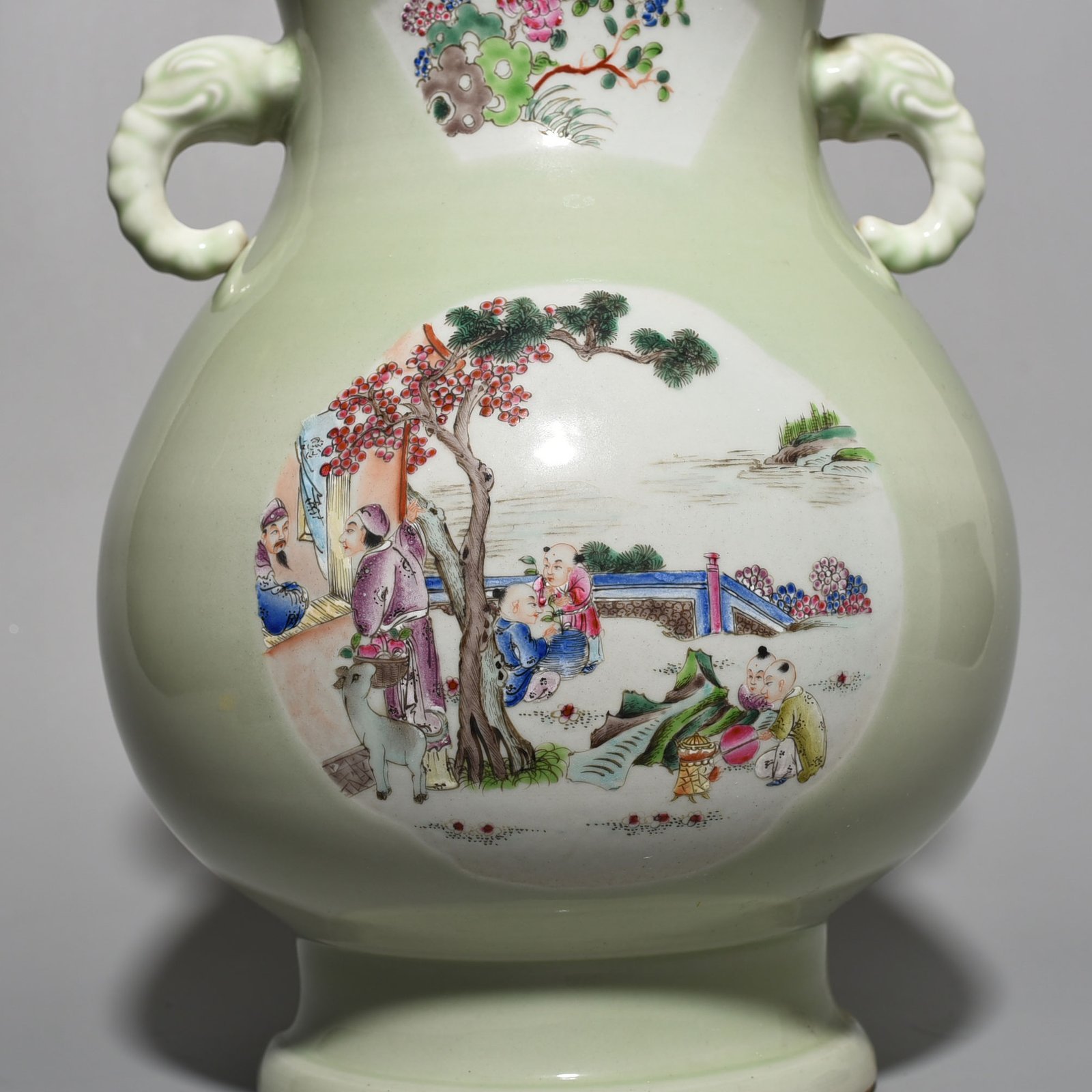 Qing Dynasty Kangxi bean green glaze pastel figure elephant ear statue