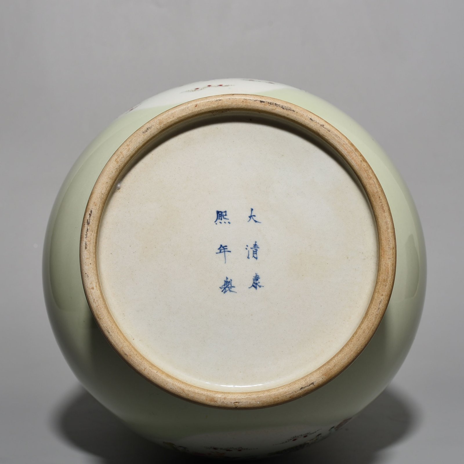 Qing Dynasty Kangxi bean green glaze pastel figure elephant ear statue