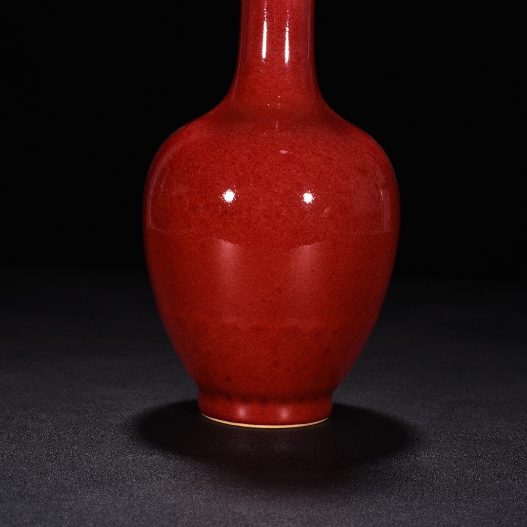 Qing Dynasty Kangxi cowpea red glaze beauty drunken chrysanthemum petal vase