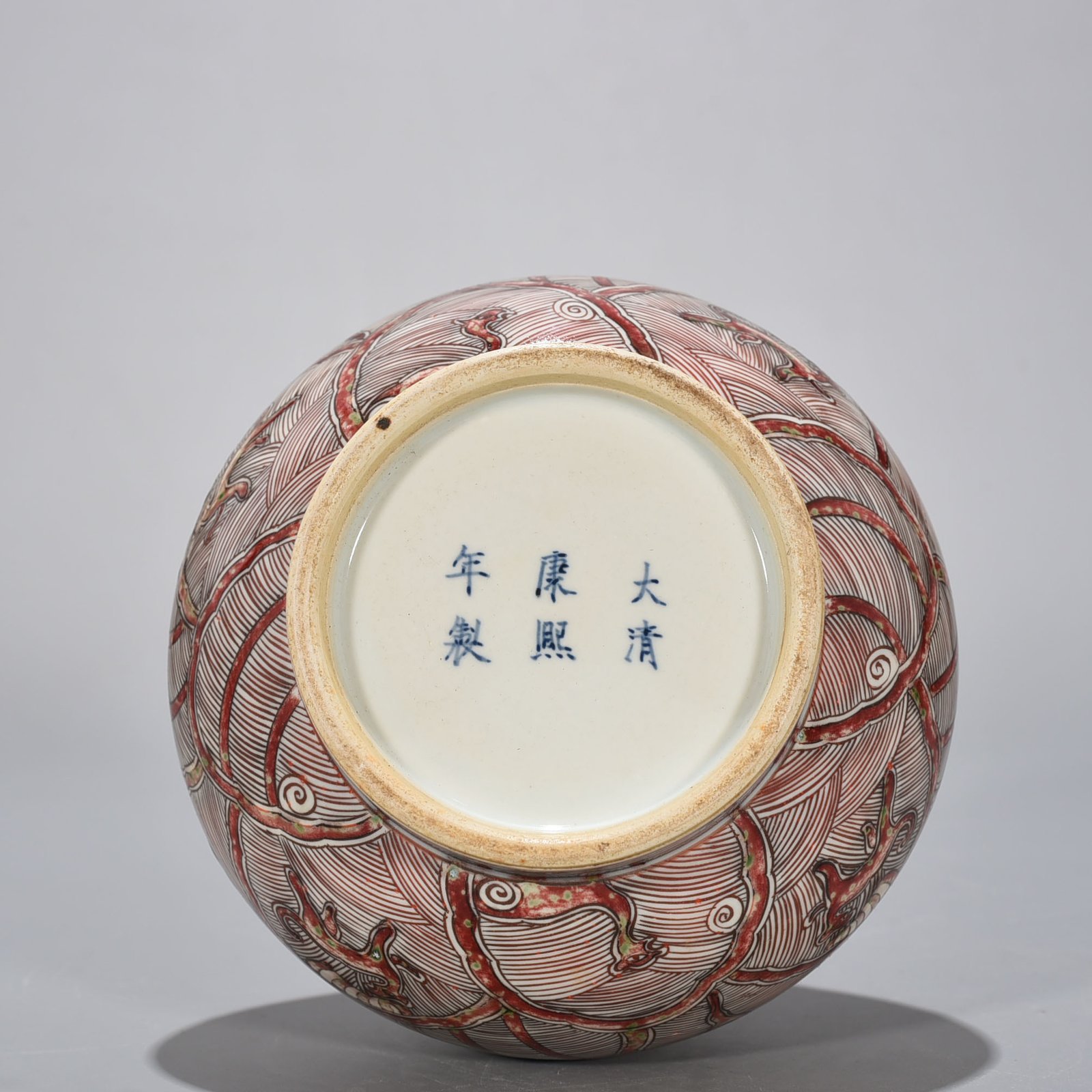 Qing Dynasty Kangxi underglaze red sea animal garlic bottle