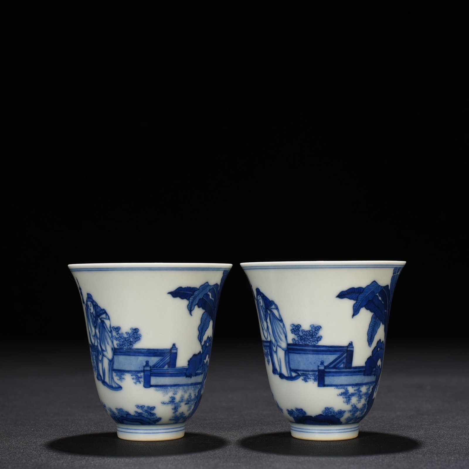 Qing Dynasty Kangxi blue and white bell cup with character story