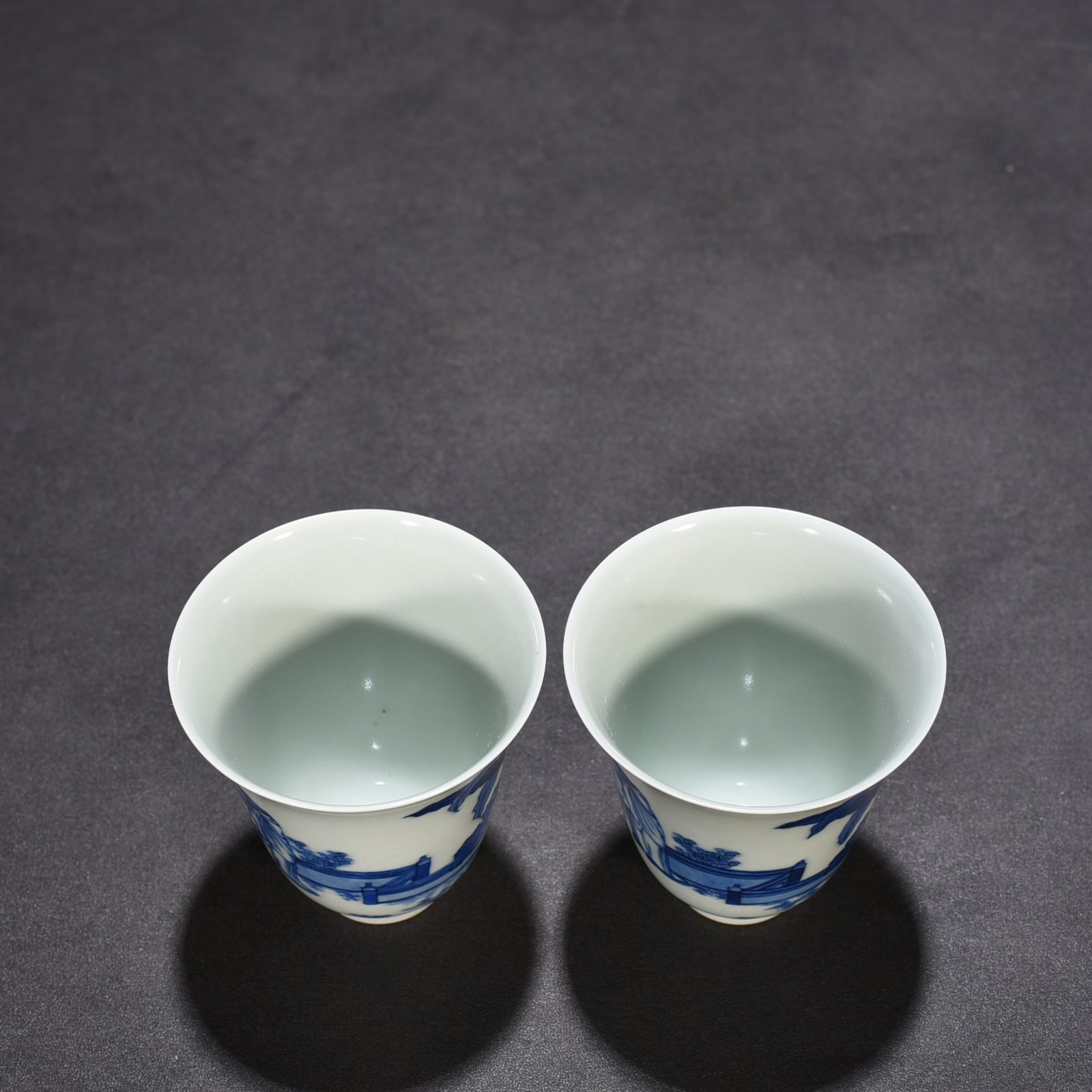 Qing Dynasty Kangxi blue and white bell cup with character story