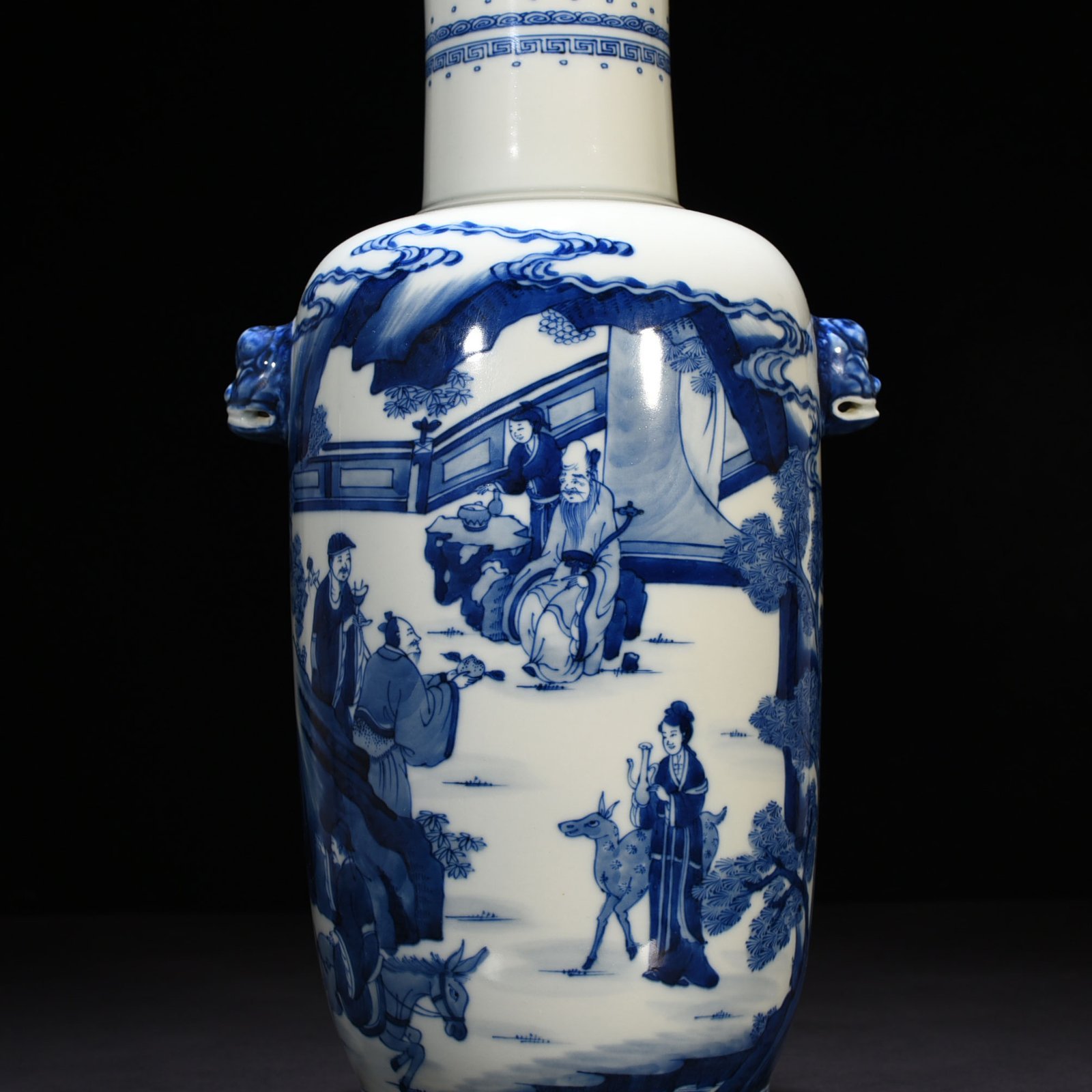Qing Dynasty Kangxi blue and white Eight Immortals animal ears disc-mouth vase