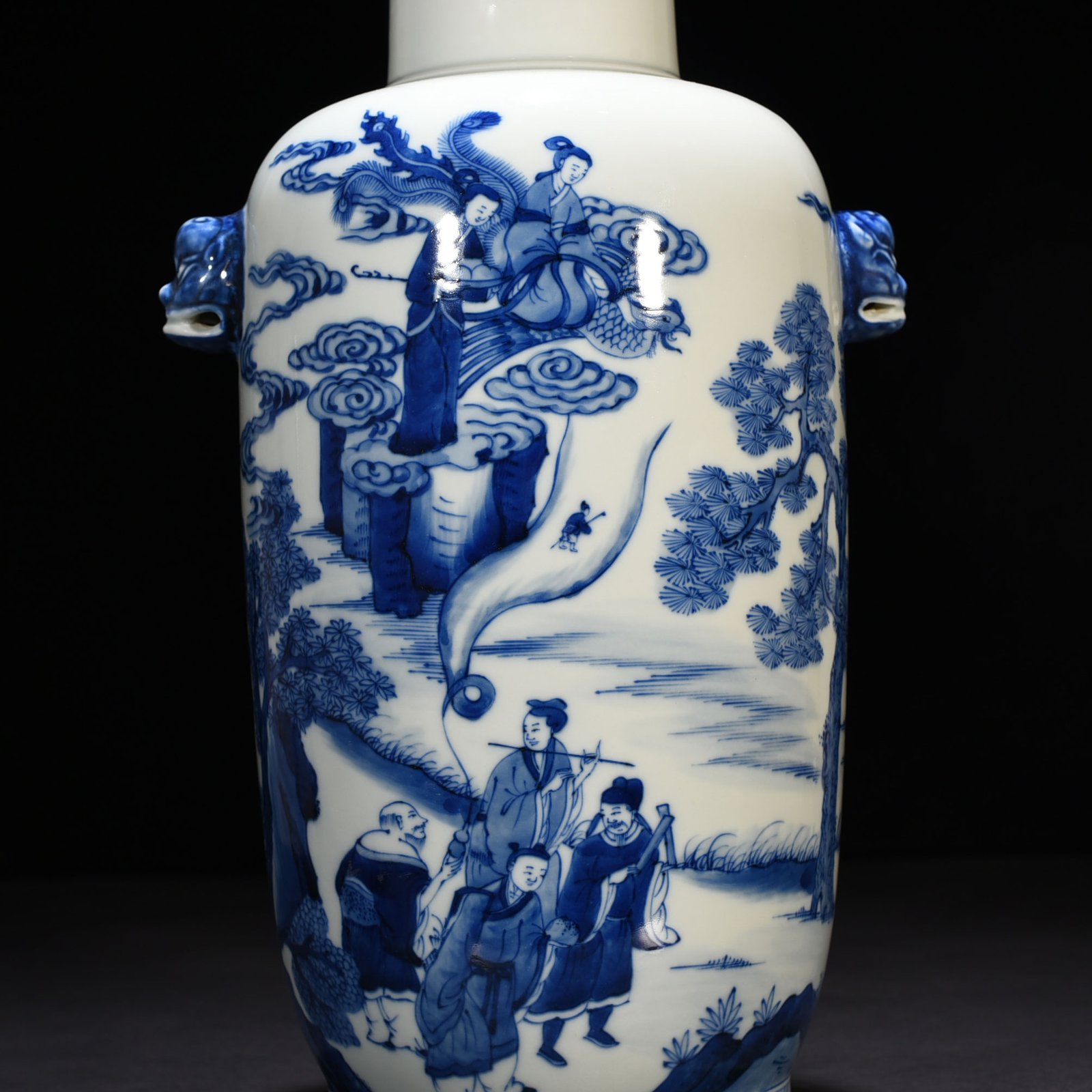 Qing Dynasty Kangxi blue and white Eight Immortals animal ears disc-mouth vase