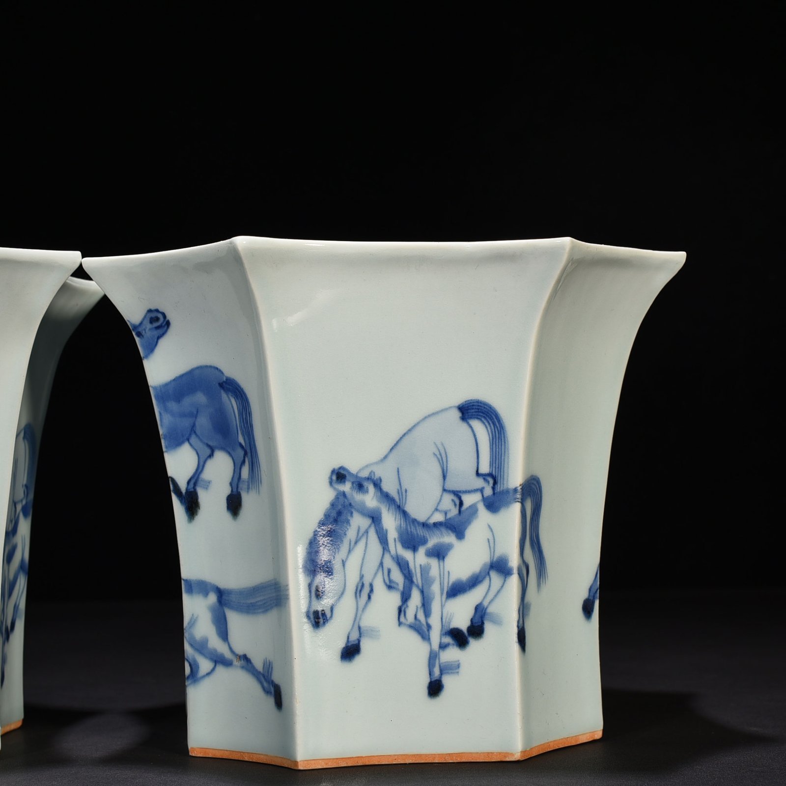 Qing Dynasty Kangxi blue and white eight horses flower pot