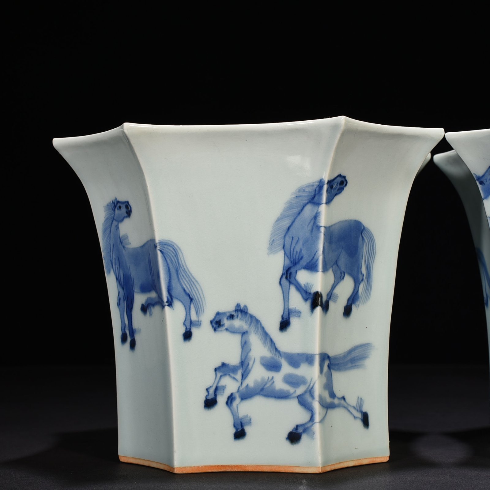 Qing Dynasty Kangxi blue and white eight horses flower pot