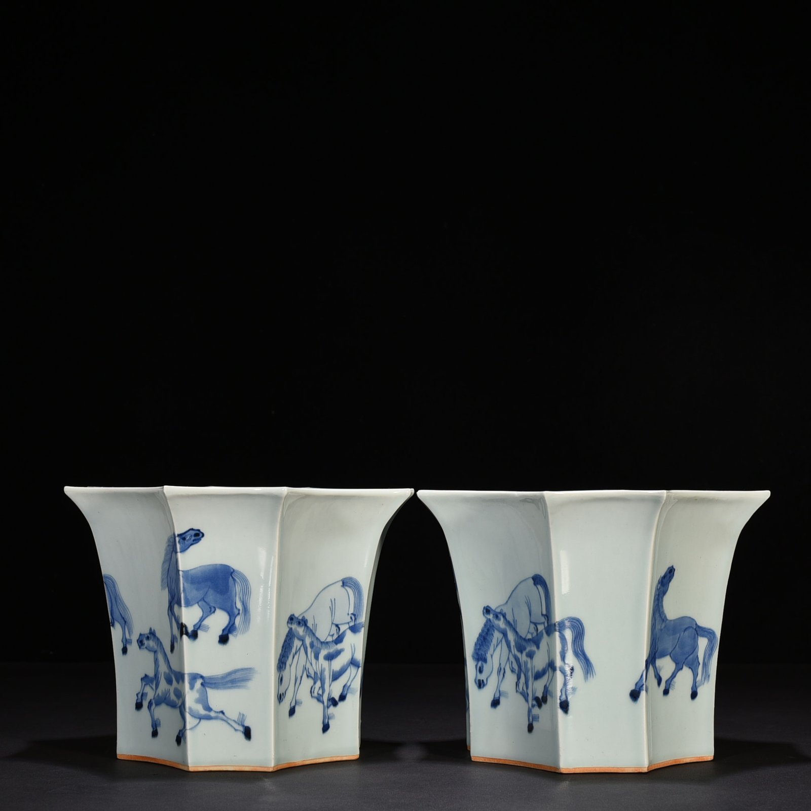 Qing Dynasty Kangxi blue and white eight horses flower pot