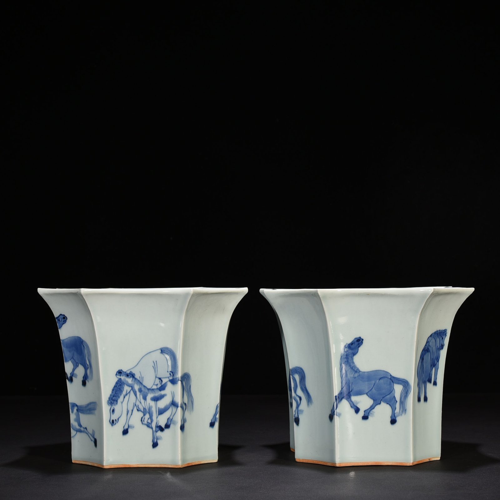 Qing Dynasty Kangxi blue and white eight horses flower pot