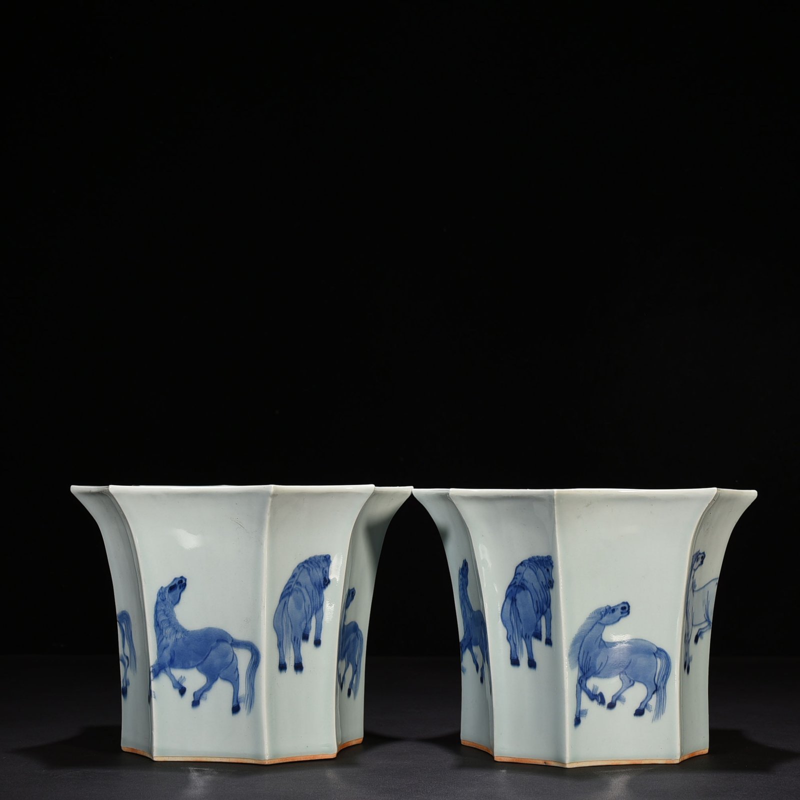 Qing Dynasty Kangxi blue and white eight horses flower pot