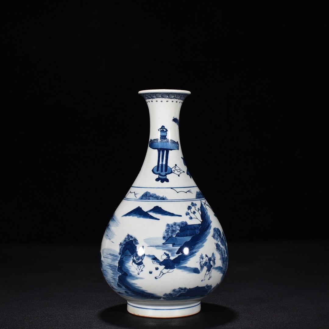 Qing Dynasty Kangxi blue and white fisherman’s figure jade pot spring vase