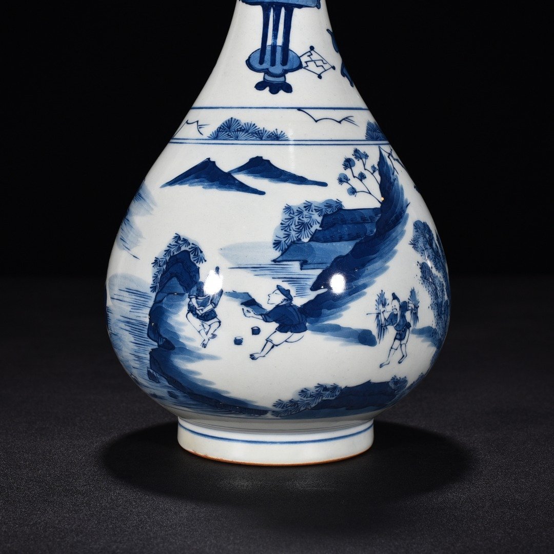 Qing Dynasty Kangxi blue and white fisherman’s figure jade pot spring vase
