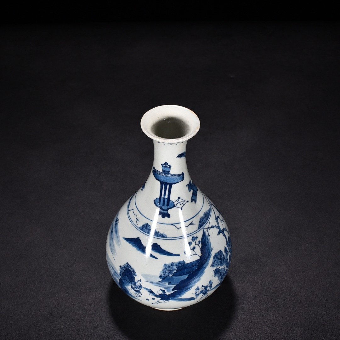 Qing Dynasty Kangxi blue and white fisherman’s figure jade pot spring vase