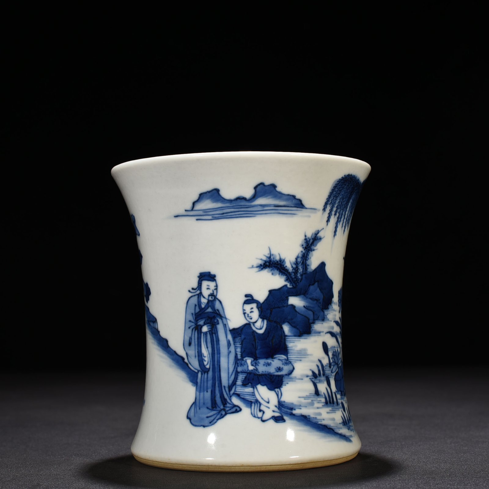 Qing Dynasty Kangxi blue and white Taoist figure waist pen holder