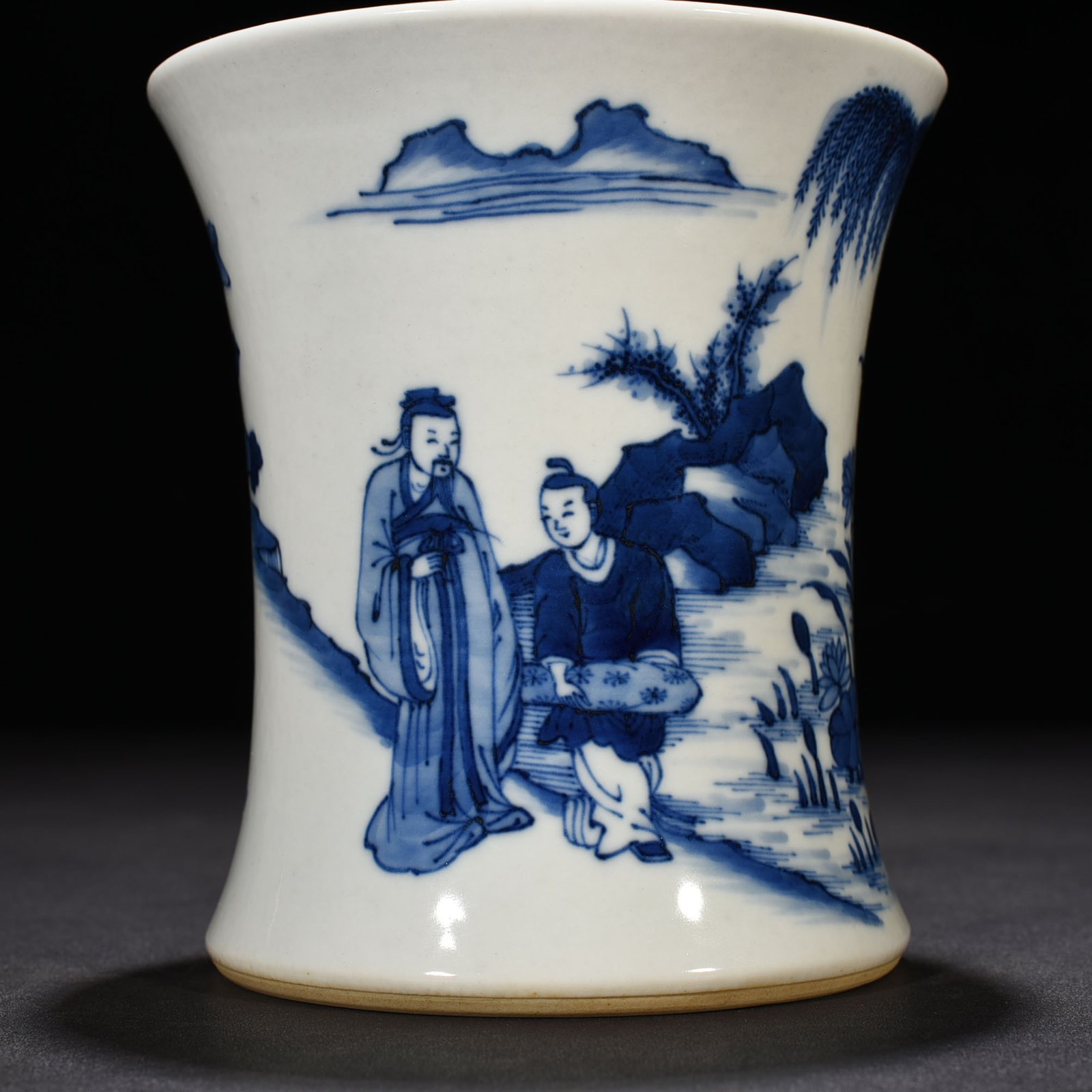 Qing Dynasty Kangxi blue and white Taoist figure waist pen holder