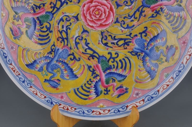 Qing Dynasty Kangxi yellow ground multicolored phoenix plate
