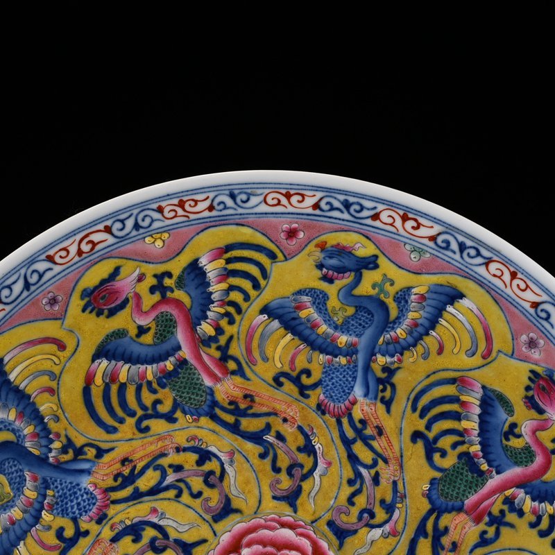 Qing Dynasty Kangxi yellow ground blue and white multicolored phoenix plate