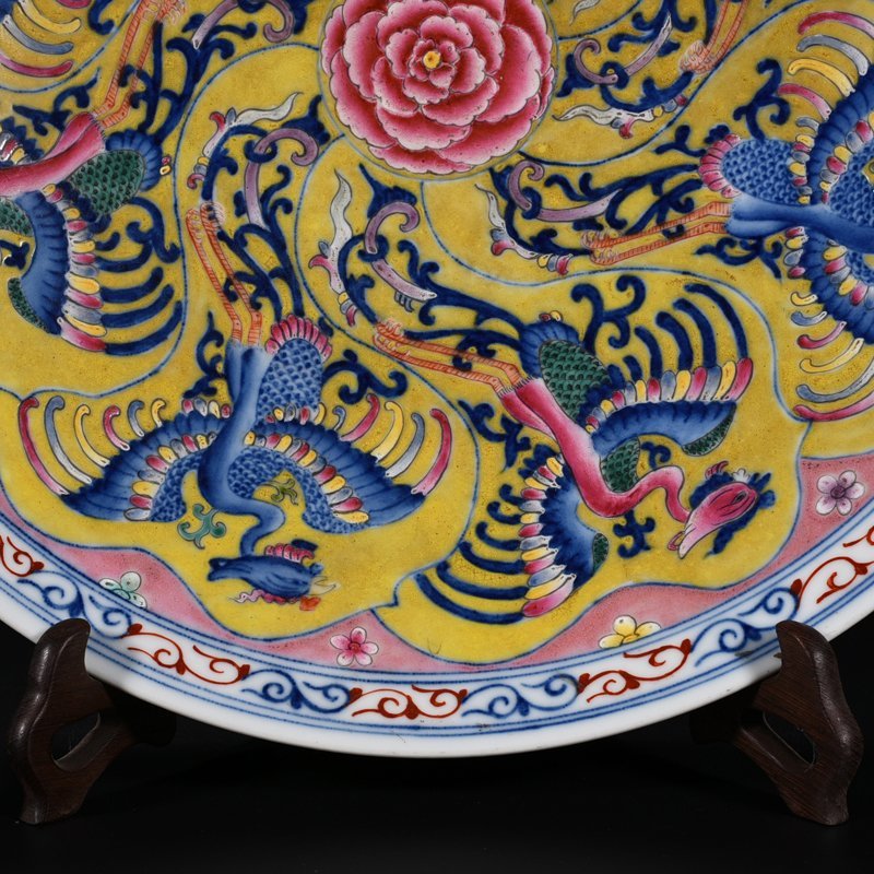 Qing Dynasty Kangxi yellow ground blue and white multicolored phoenix plate