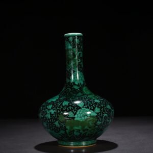 Qing Dynasty Kangxi black ground green glaze straight neck vase