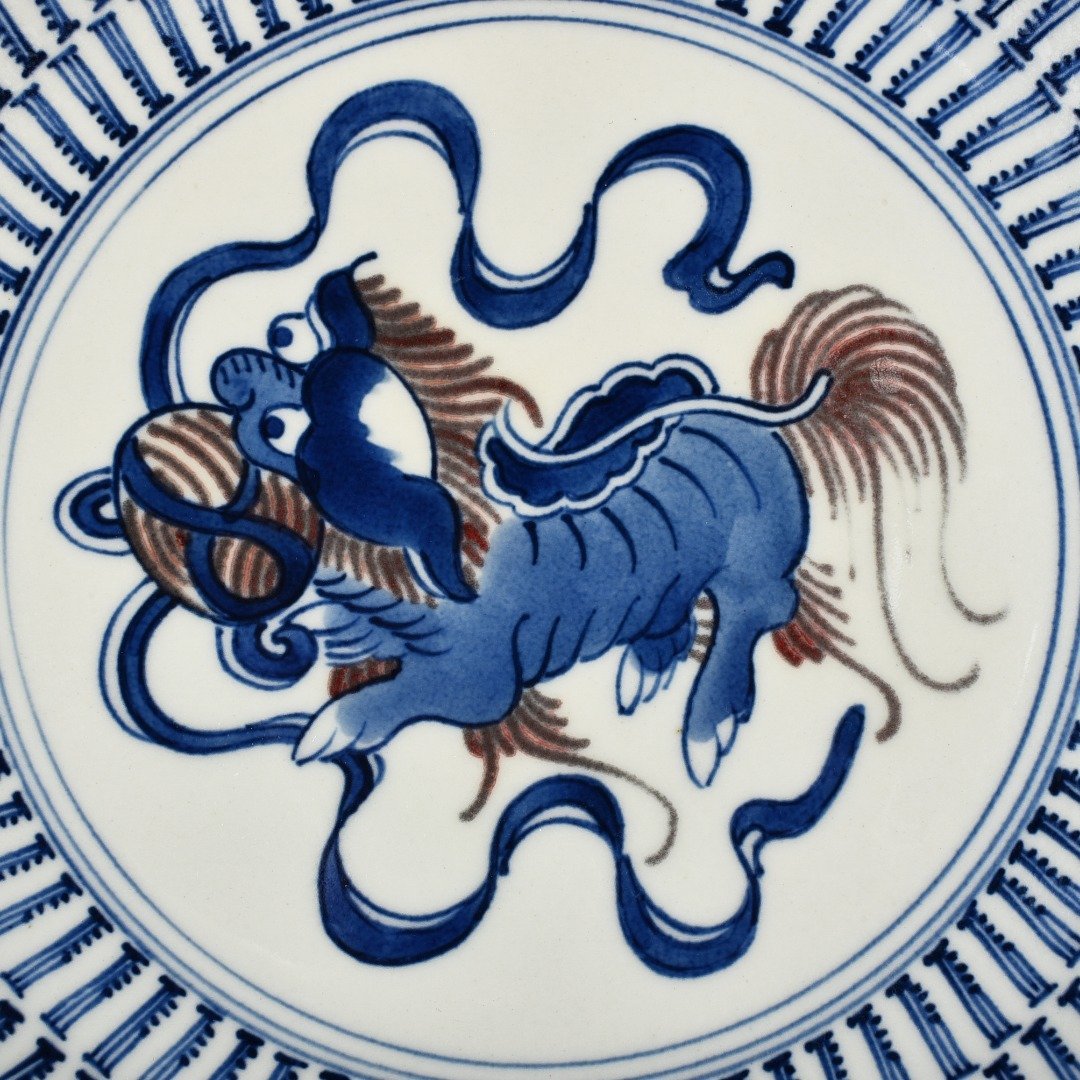 Qing Dynasty blue and white glaze red lion hydrangea plate