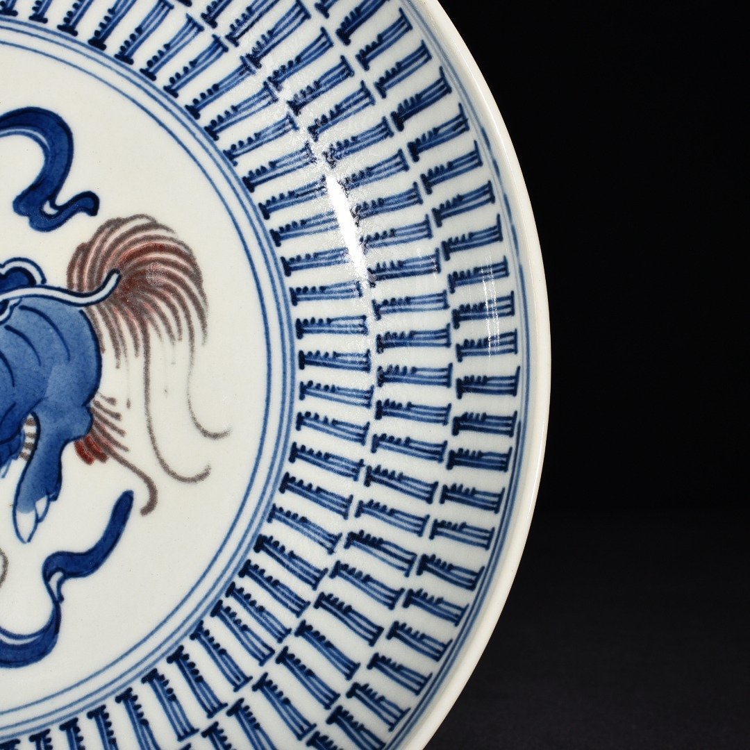 Qing Dynasty blue and white glaze red lion hydrangea plate
