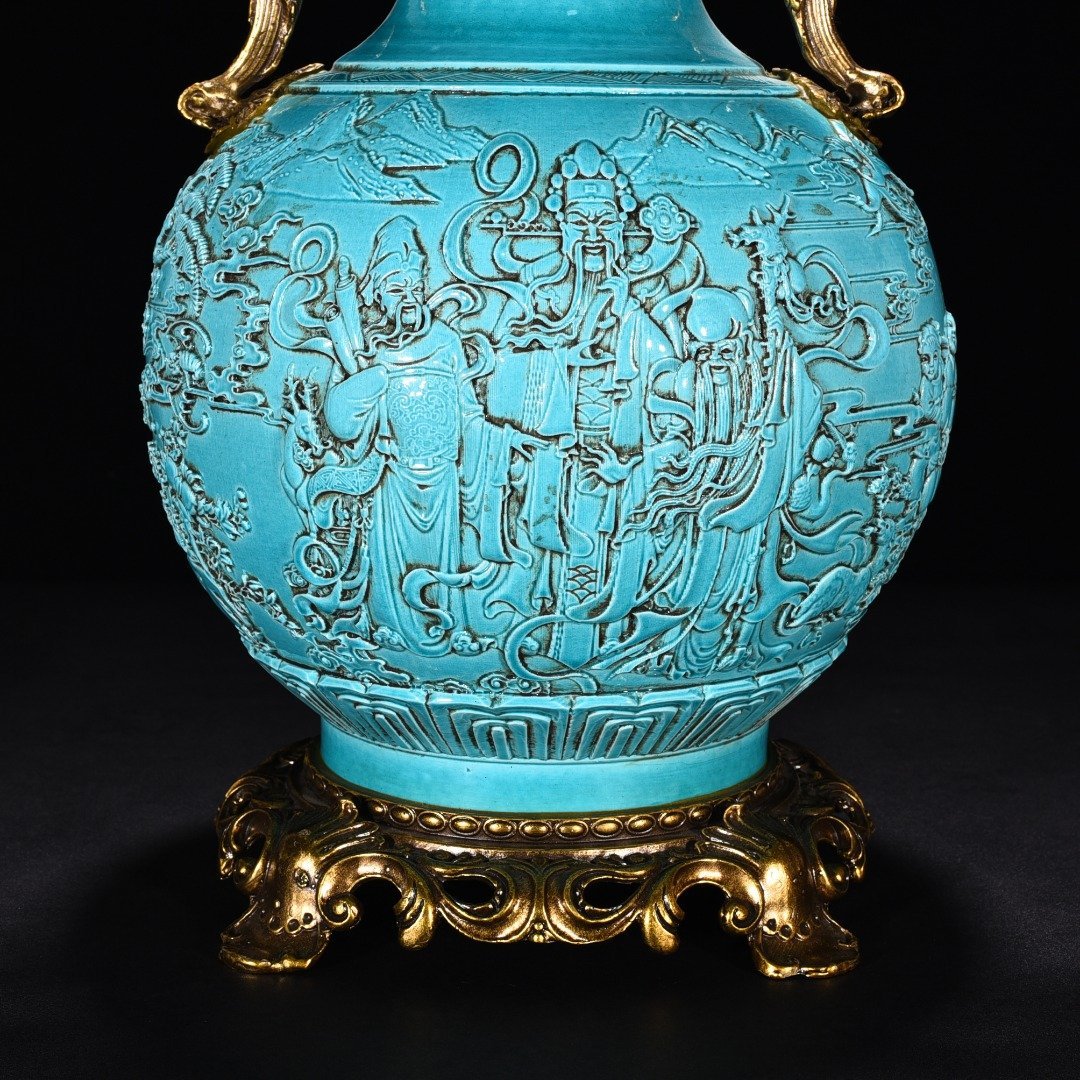 Qing Dynasty peacock blue and green glaze engraved with blessings vase
