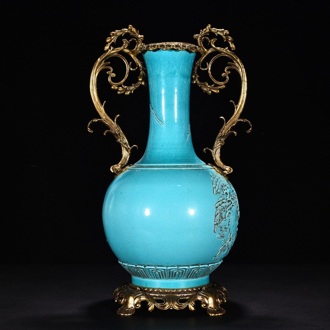 Qing Dynasty peacock blue and green glaze engraved with blessings vase