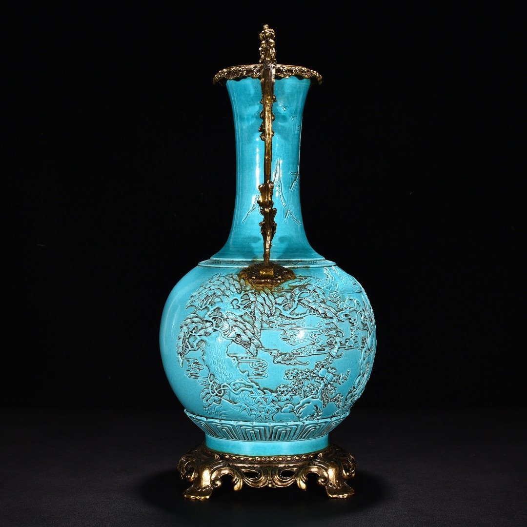 Qing Dynasty peacock blue and green glaze engraved with blessings vase