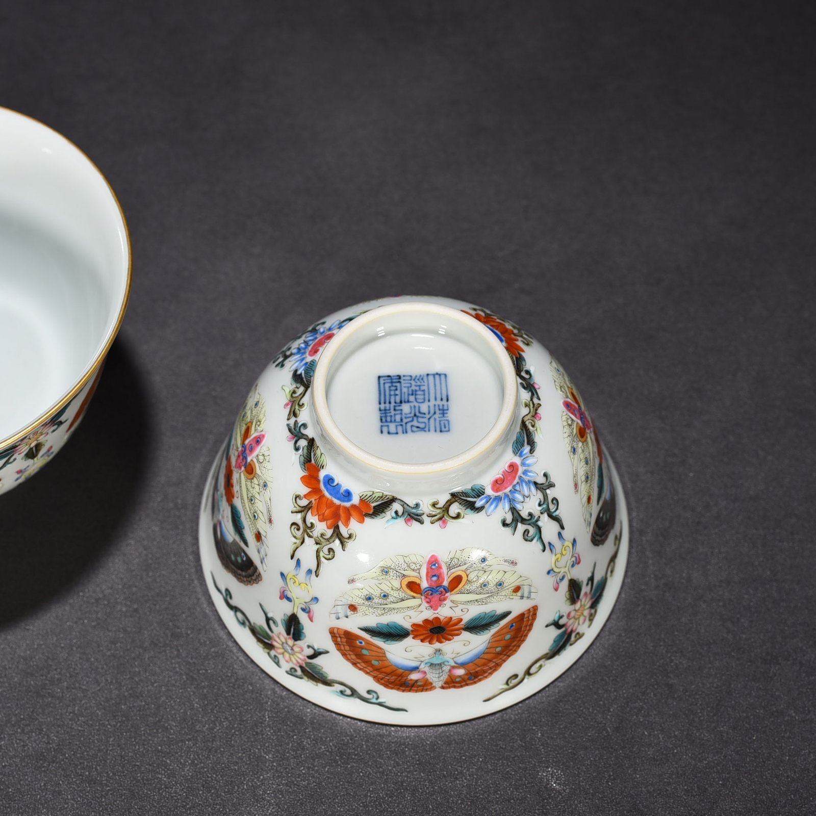 Qing Dynasty Daoguang pastel butterfly and flower bowl