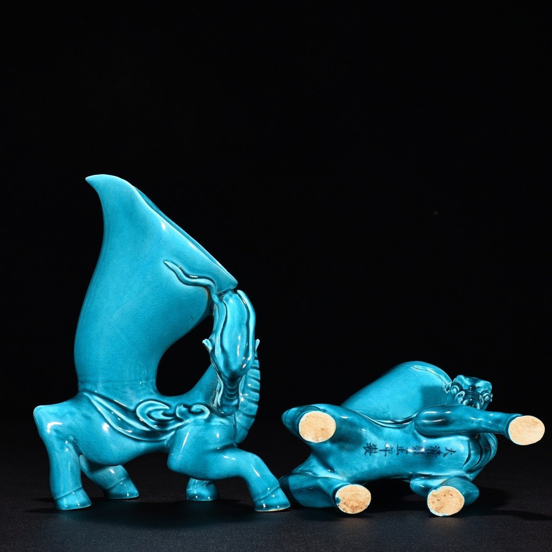 Qing Dynasty Yongzheng peacock blue glaze Dragon Cup