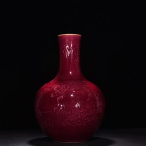 Qing Dynasty Yongzheng ruby ​​red glaze relief celestial sphere vase with cloud and dragon