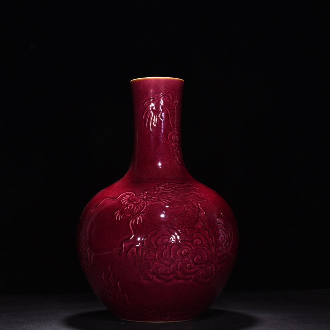 Qing Dynasty Yongzheng ruby ​​red glaze relief celestial sphere vase with cloud and dragon