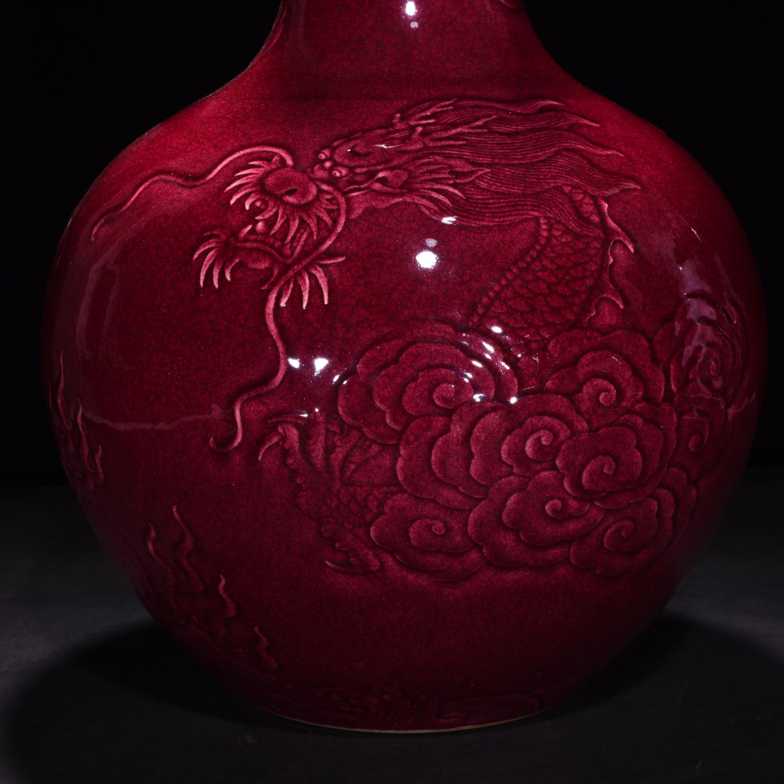 Qing Dynasty Yongzheng ruby ​​red glaze relief celestial sphere vase with cloud and dragon