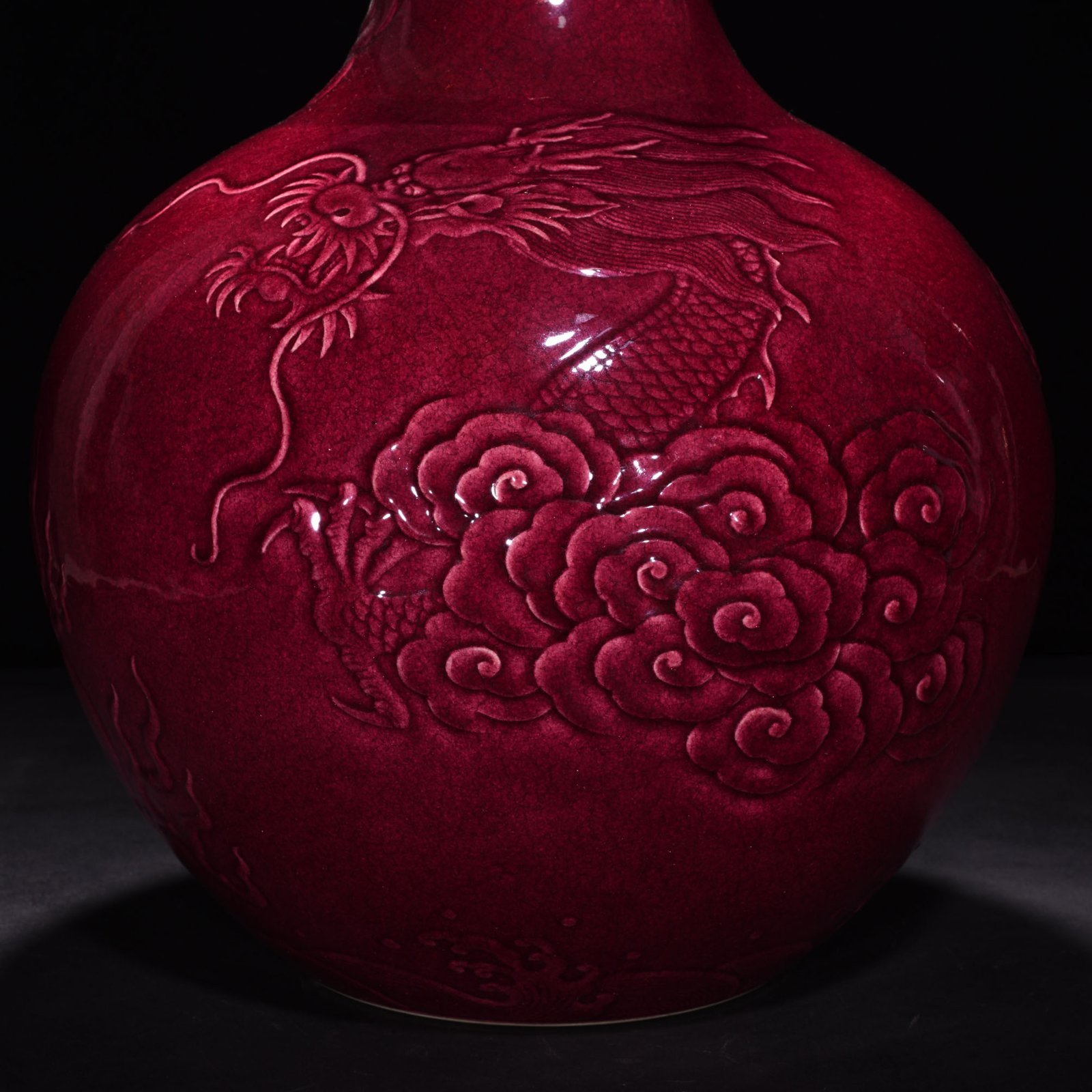 Qing Dynasty Yongzheng gem-glazed celestial sphere vase with relief cloud and dragon
