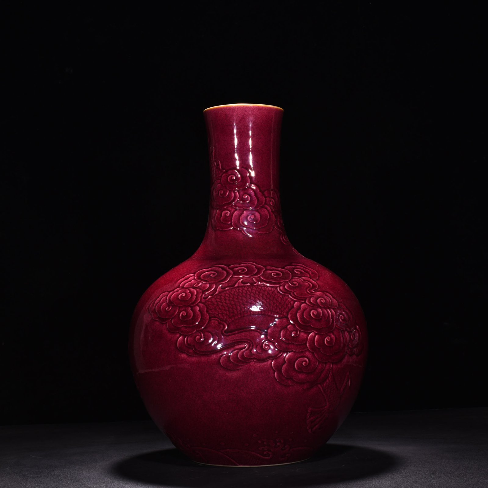 Qing Dynasty Yongzheng gem-glazed celestial sphere vase with relief cloud and dragon