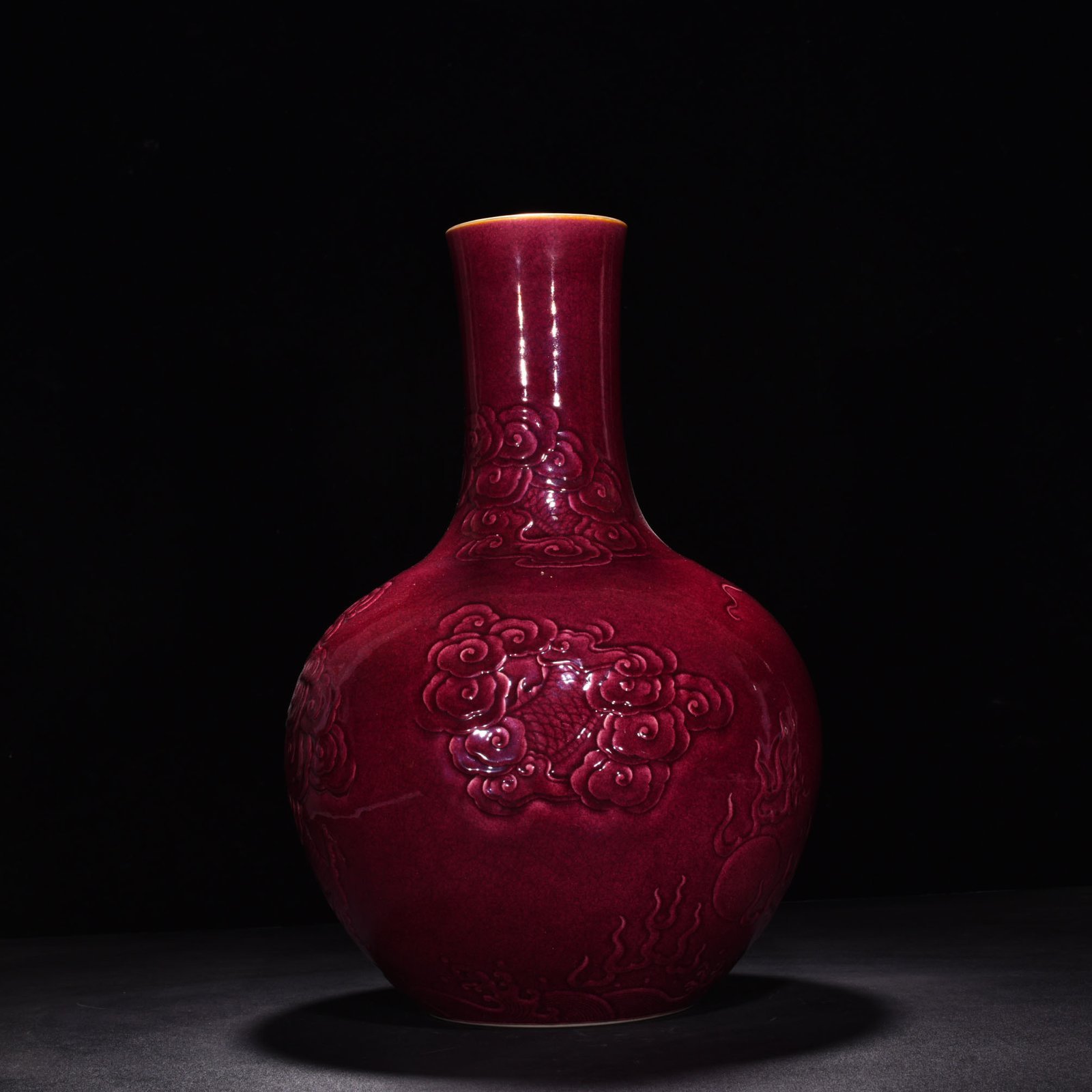 Qing Dynasty Yongzheng gem-glazed celestial sphere vase with relief cloud and dragon