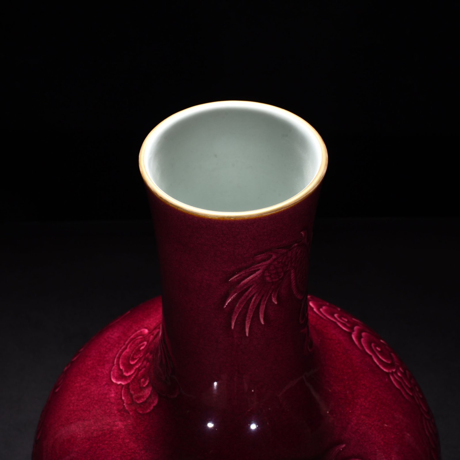 Qing Dynasty Yongzheng gem-glazed celestial sphere vase with relief cloud and dragon
