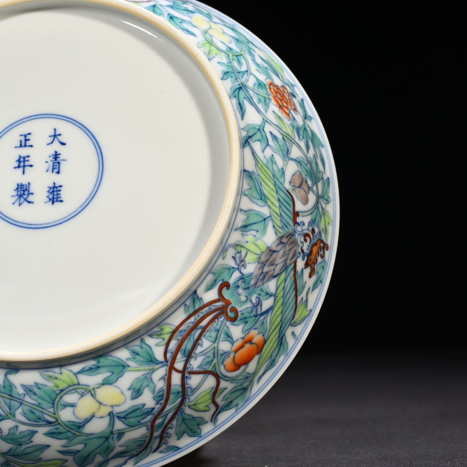 Qing Dynasty Yongzheng doucai entwined phoenix and peony dish