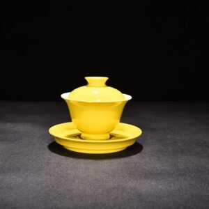 Qing Dynasty Yongzheng lemon yellow glaze three-cai bowl